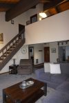 Mammoth Condo Rental Sunrise 1 - Open area Living Room towards the Entrance and the Stairs to the Loft